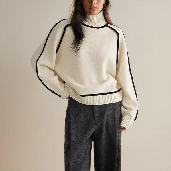 PULL CONTEMPORAIN À COL MONTANT ET FINITIONS NOIRES