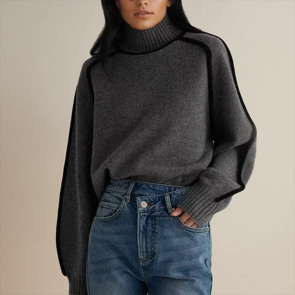 PULL CONTEMPORAIN À COL MONTANT ET FINITIONS NOIRES